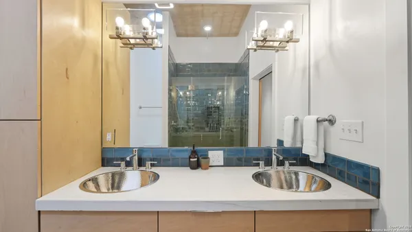 a bathroom with a sink double vanity