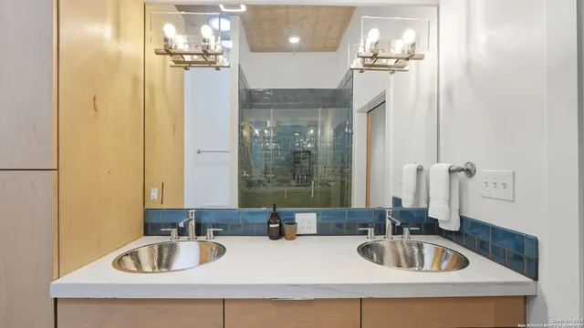 a bathroom with a sink double vanity
