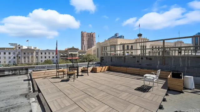 a view of a terrace with sitting area