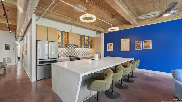 a dinning table and chairs in a room