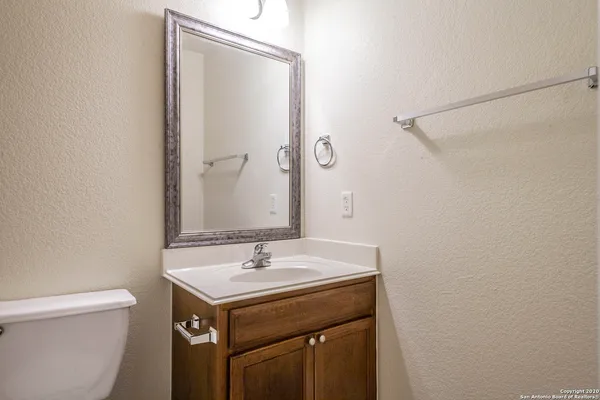 a bathroom with a sink and a toilet