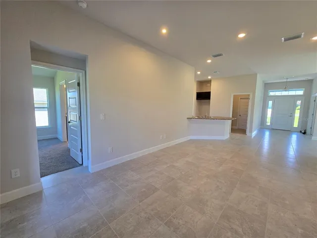 a view of bathroom with a shower and a sink