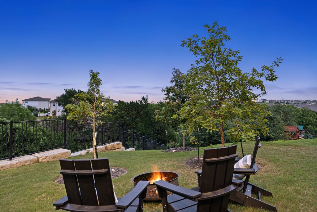 305 Avena Trail Austin, TX 78738 - Photo 13 of 40 a view of a chairs and table in the patio