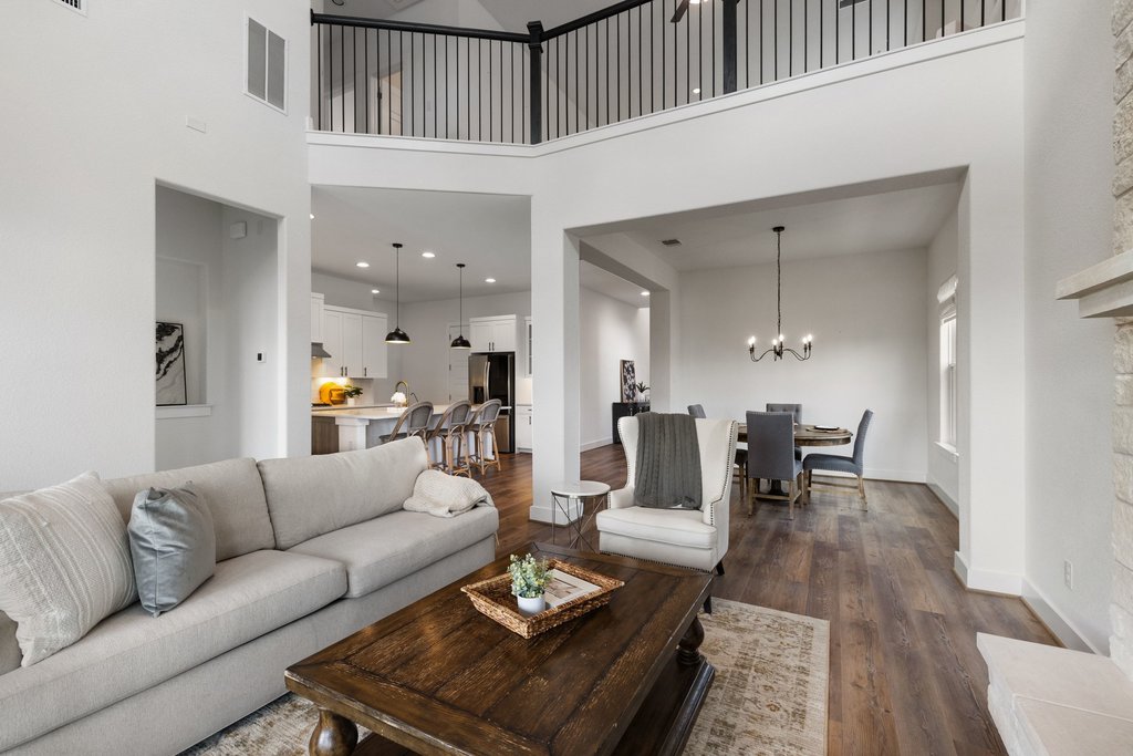 305 Avena Trail Austin, TX 78738 - Photo 24 of 40 a living room with furniture and wooden floor