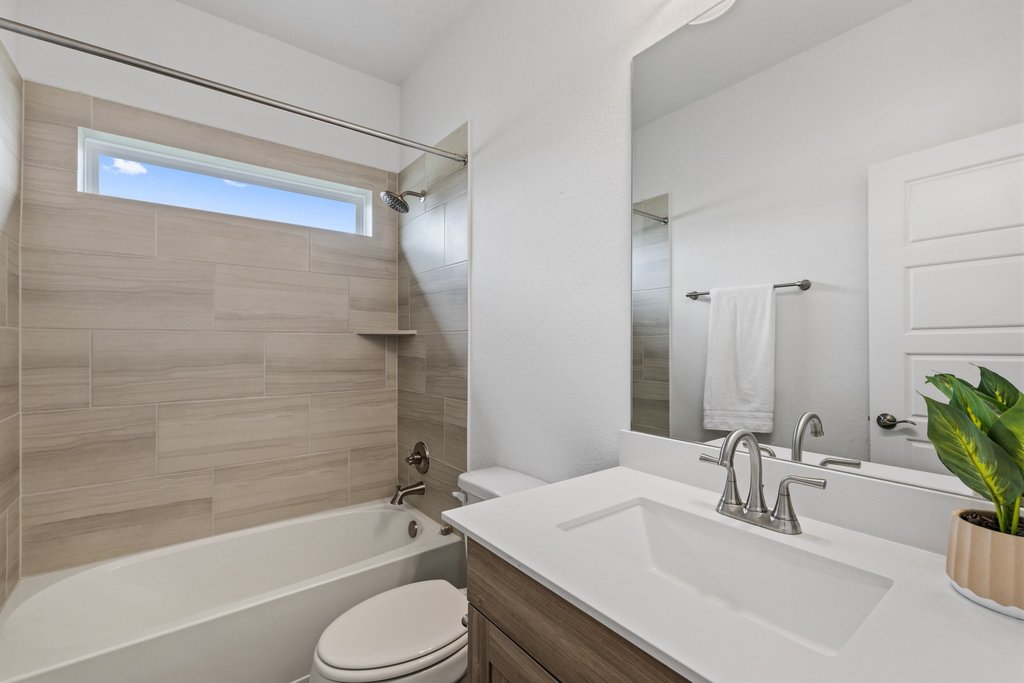 305 Avena Trail Austin, TX 78738 - Photo 34 of 40 a bathroom with a sink toilet tub and shower