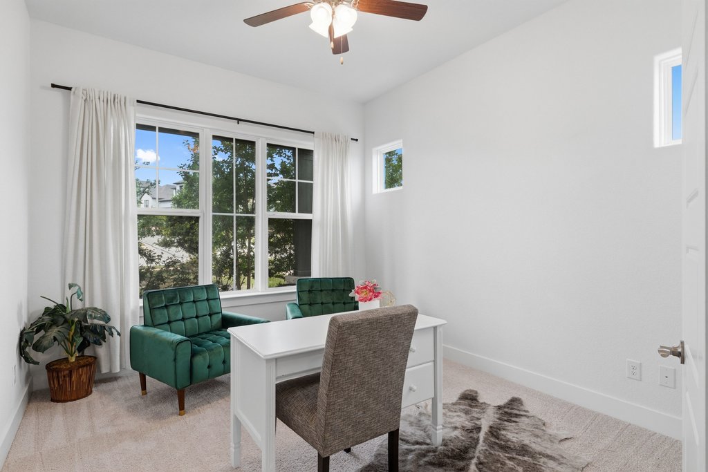 305 Avena Trail Austin, TX 78738 - Photo 6 of 40 a living room with furniture and a potted plant