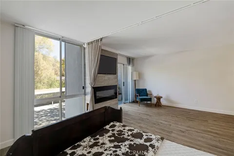 a view of kitchen and living room with windows