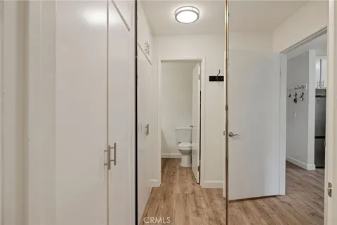 a view of a balcony with a floor to ceiling window