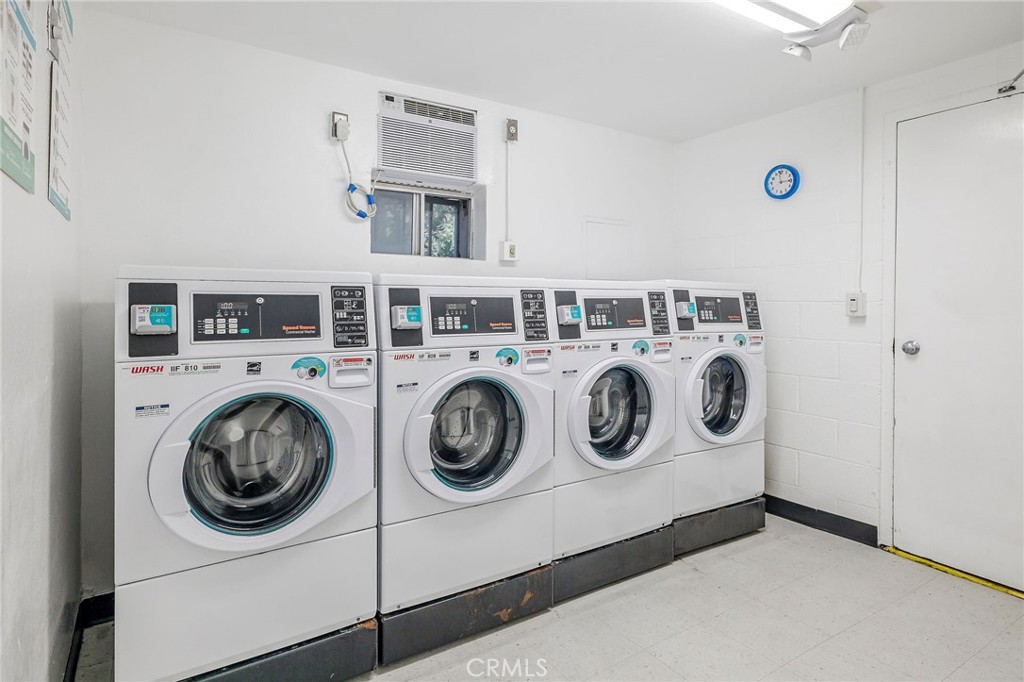 3604 West Estates Lane, Unit 114 Rolling Hills Estates, CA 90274 - Photo 39 of 59 a utility room with dryer and washer
