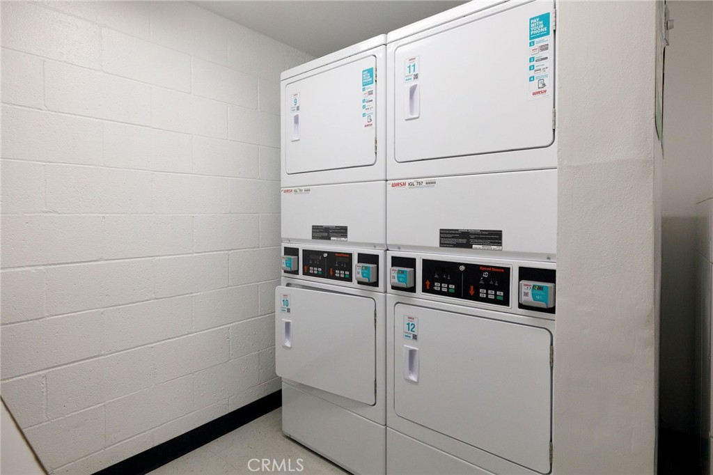3604 West Estates Lane, Unit 114 Rolling Hills Estates, CA 90274 - Photo 40 of 59 a utility room with dryer and washer