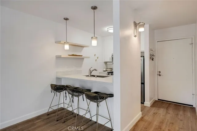 a view of a dining room and wooden floor