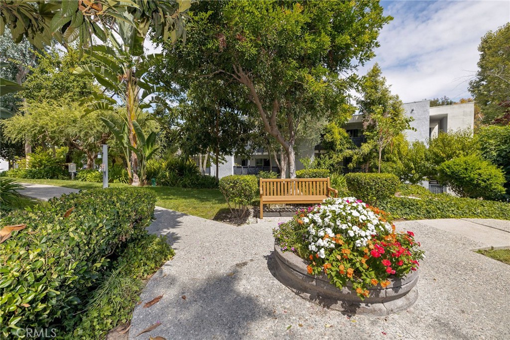 3604 West Estates Lane, Unit 114 Rolling Hills Estates, CA 90274 - Photo 42 of 59 a view of a garden with an outdoor seating