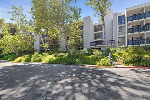 a view of a street with a building
