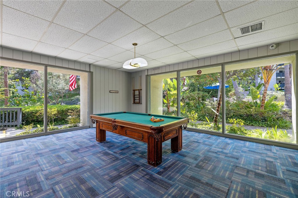 3604 West Estates Lane, Unit 114 Rolling Hills Estates, CA 90274 - Photo 47 of 59 a room with pool table and windows