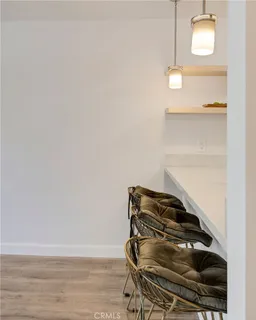 a bedroom with a bed window and a flat screen tv