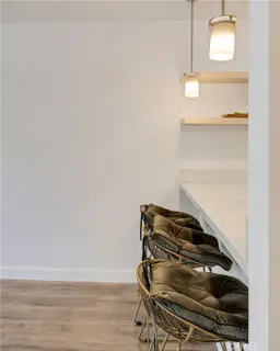 a bedroom with a bed window and a flat screen tv