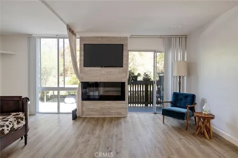 a view of workspace with furniture and windows