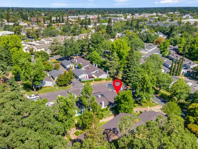 an aerial view of residential house with outdoor space