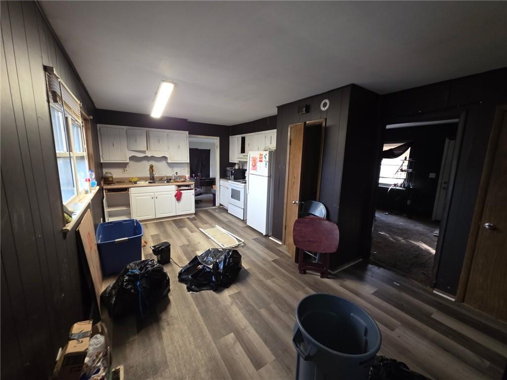 676 Hog Liver Road Carrollton, GA 30117 - Photo 2 of 21 a kitchen with stainless steel appliances a refrigerator and a stove