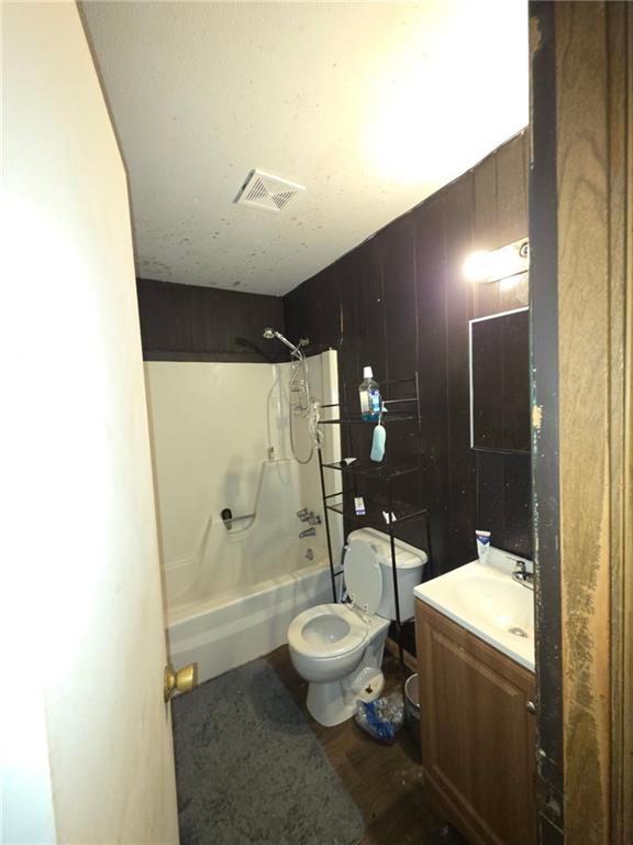 676 Hog Liver Road Carrollton, GA 30117 - Photo 6 of 21 a bathroom with a toilet sink and shower