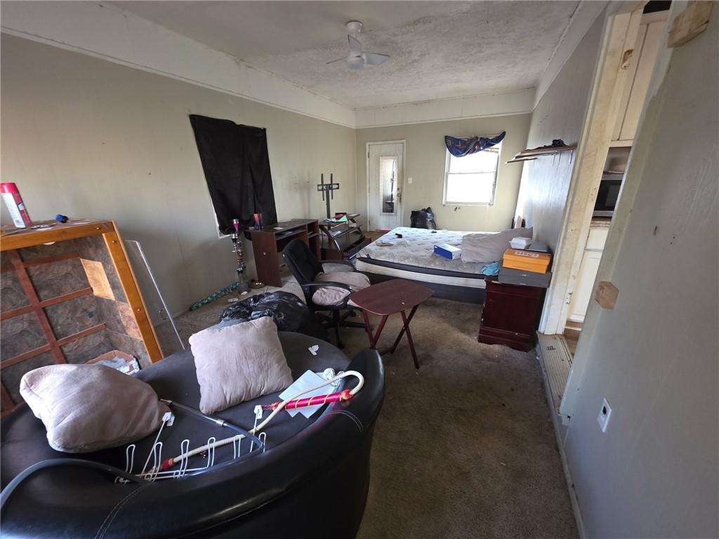 676 Hog Liver Road Carrollton, GA 30117 - Photo 7 of 21 a living room with furniture and a mirror