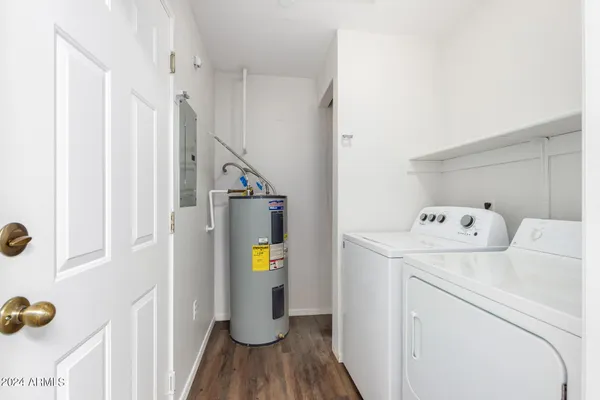 a view of a hallway with entryway door