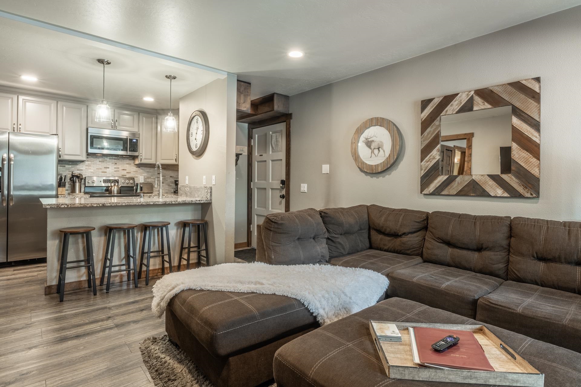 2499 Sierra Nevada Road, Unit S1 Mammoth Lakes, CA 93546 - Photo 1 of 38 Living room with wood finished floors and recessed lighting
