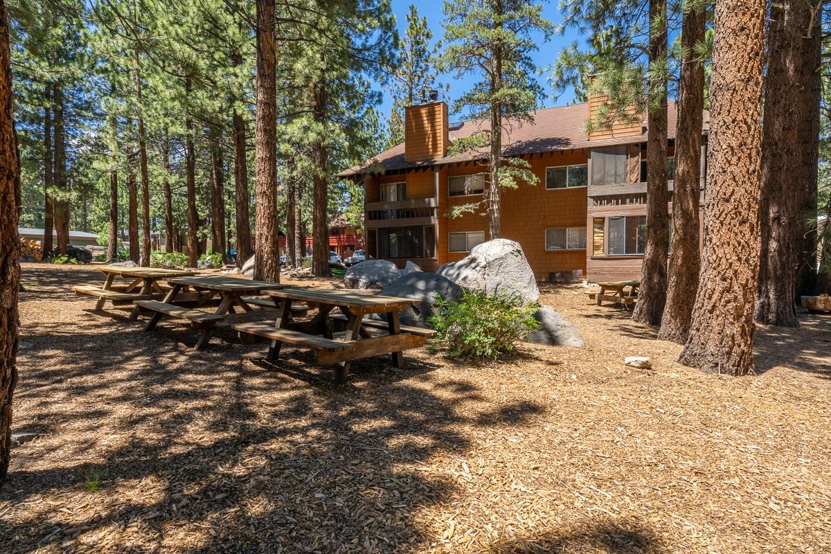 2499 Sierra Nevada Road, Unit S1 Mammoth Lakes, CA 93546 - Photo 32 of 38 Back of property featuring a chimney