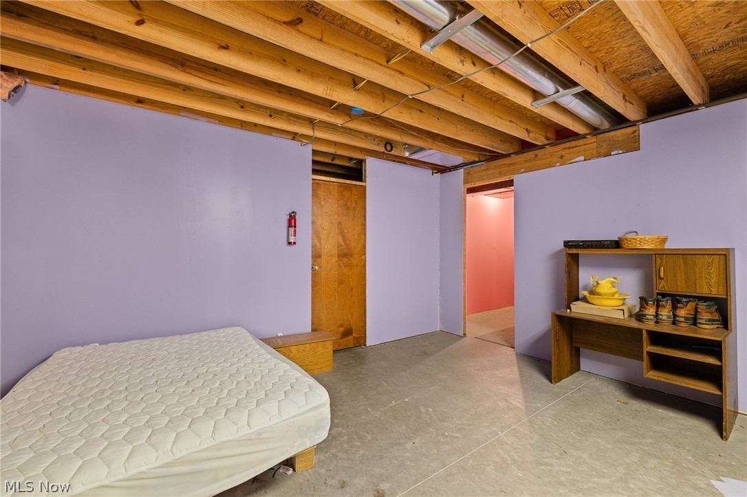 2335 South Funk Road Wooster, OH 44691 - Photo 26 of 47 Bedroom featuring concrete floors
