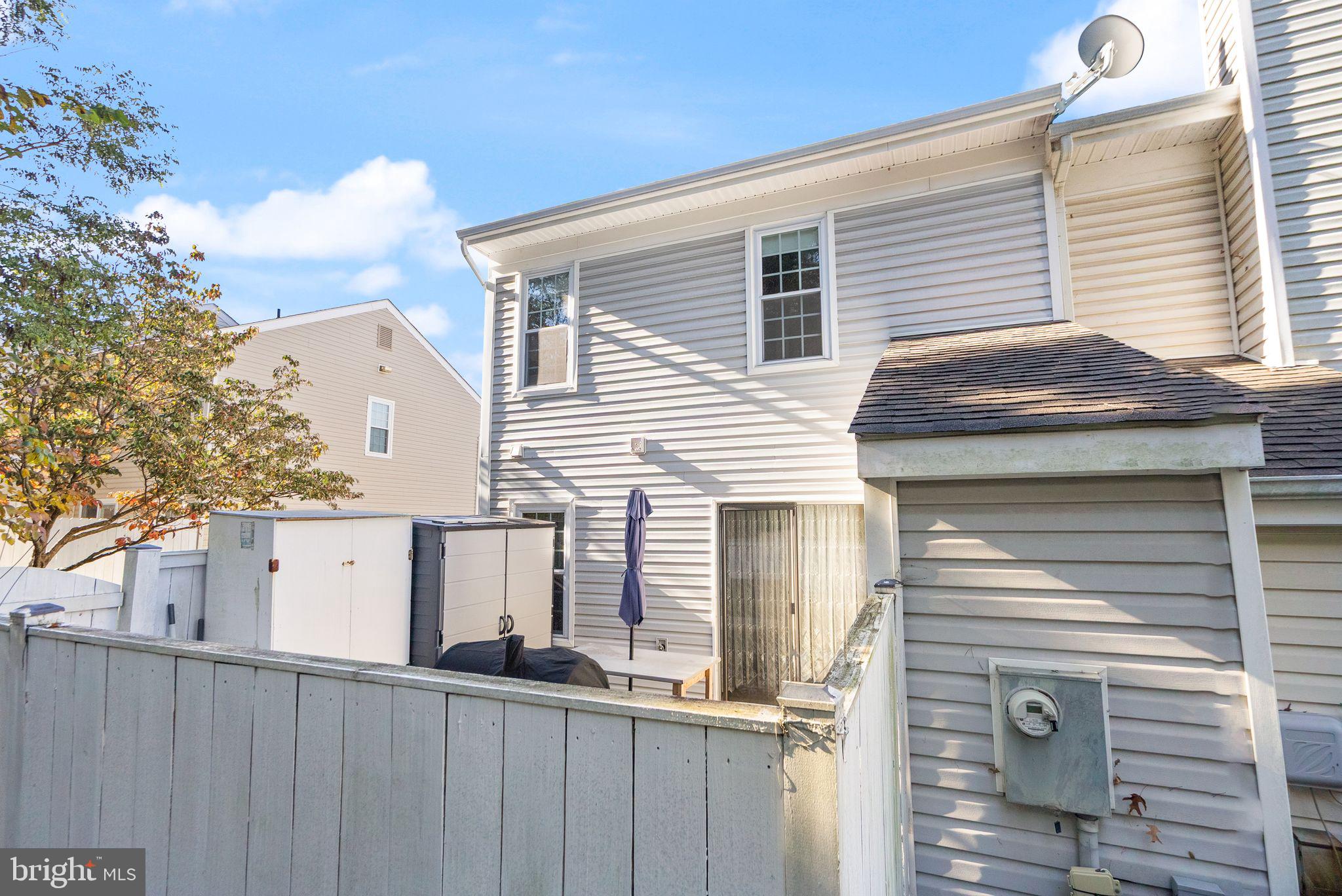 346 Lancaster Square Sterling, VA 20164 - Photo 17 of 24 a front view of a house with a garage
