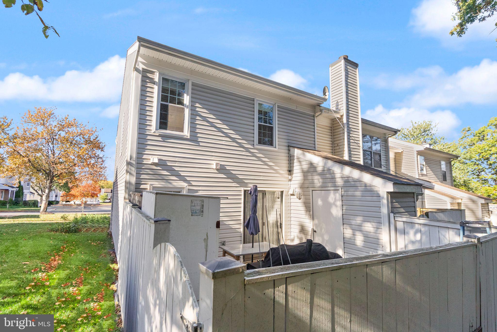 346 Lancaster Square Sterling, VA 20164 - Photo 18 of 24 a front view of a house with garden