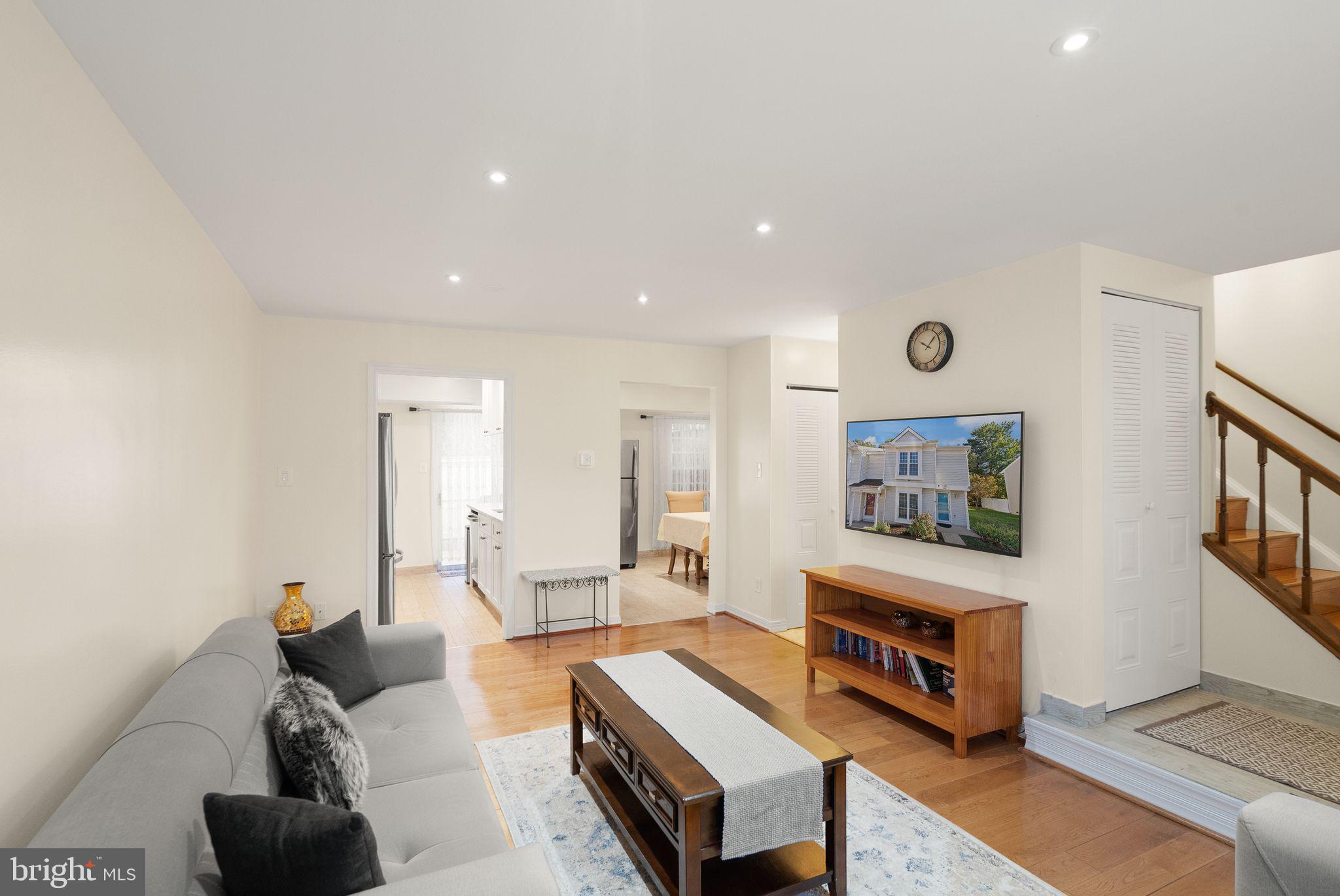 346 Lancaster Square Sterling, VA 20164 - Photo 9 of 24 a living room with furniture and a flat screen tv