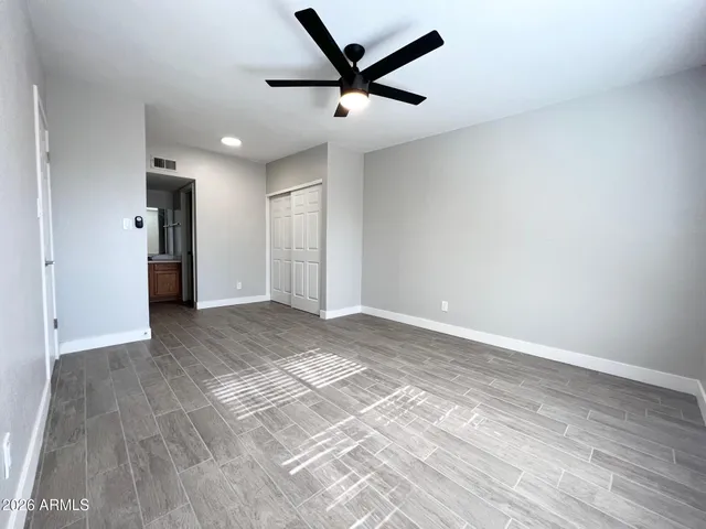 a bathroom with a double vanity sink and mirror