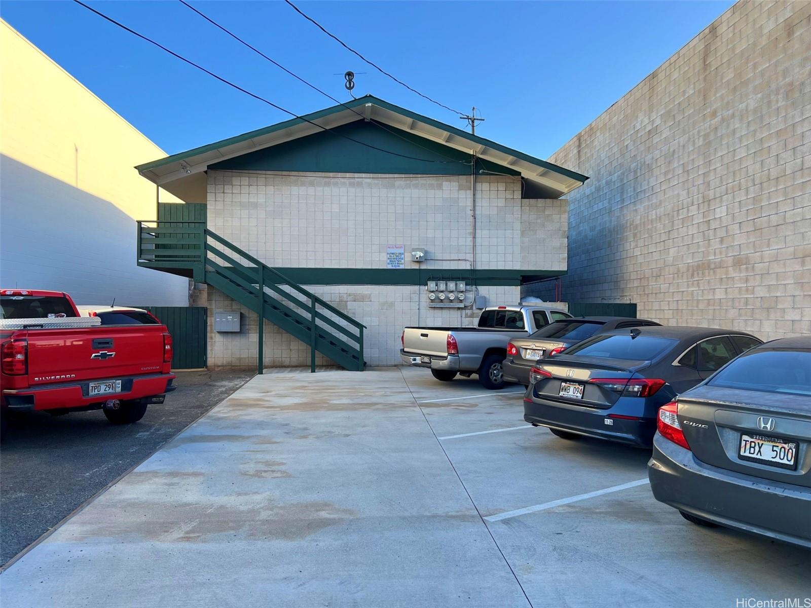 1722 Democrat Street Honolulu, HI 96819 - Photo 7 of 8 a car parked in front of a house