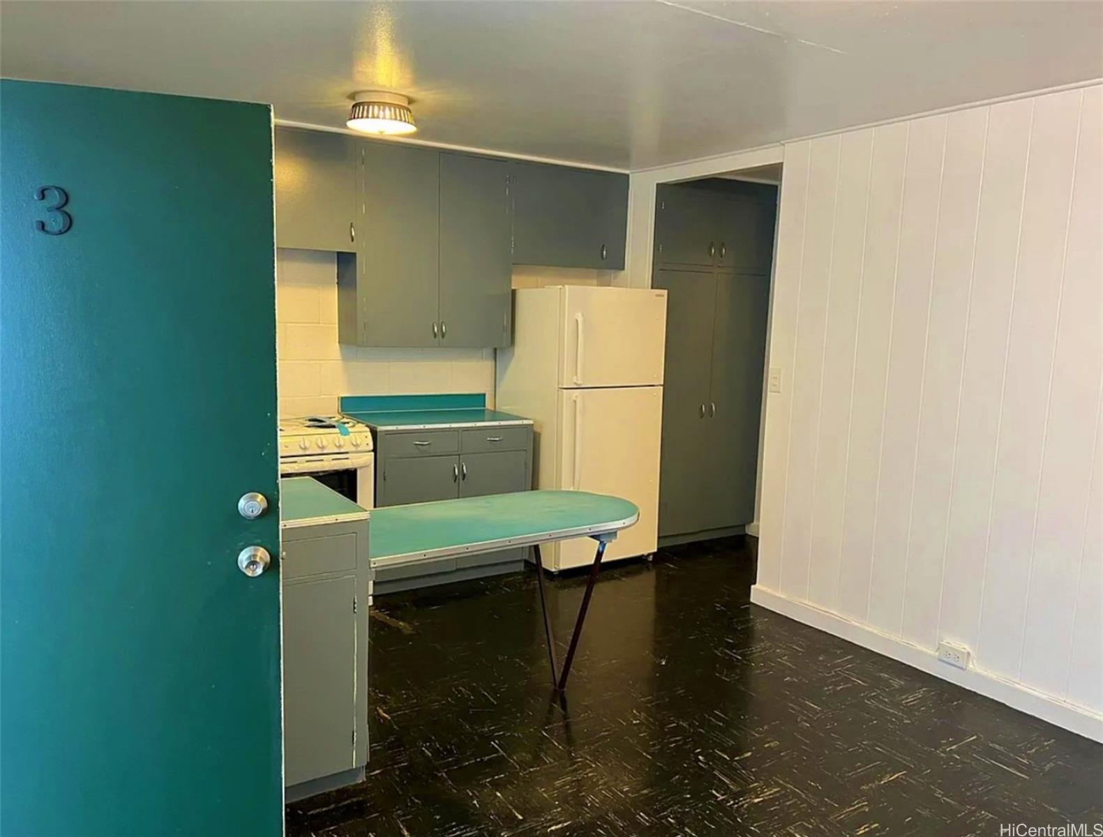 1722 Democrat Street Honolulu, HI 96819 - Photo 8 of 8 a room with a table and chairs