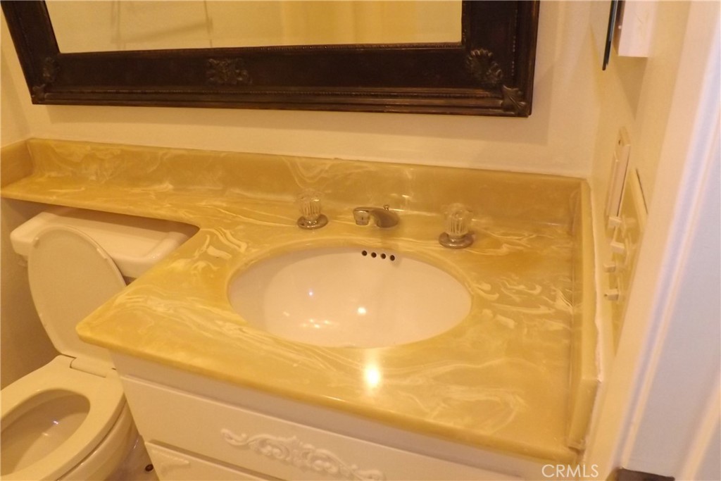 130 Avenida Adobe San Clemente, CA 92672 - Photo 17 of 26 a bathroom with a sink and a toilet