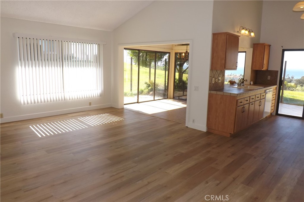 130 Avenida Adobe San Clemente, CA 92672 - Photo 9 of 26 a view of an empty room with glass door