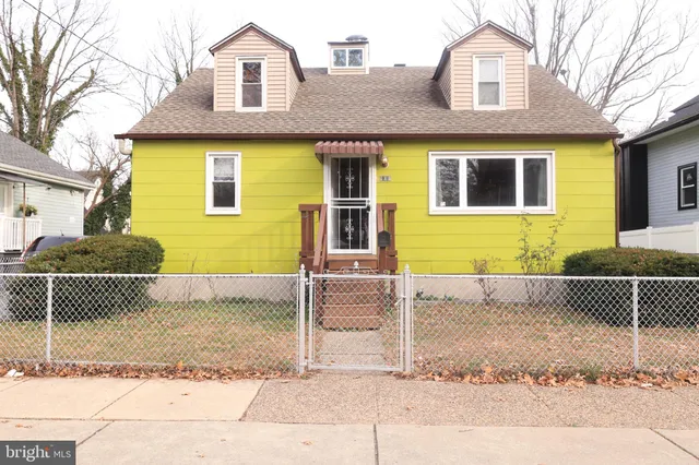 a front view of a house with a garage