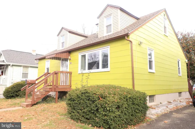 a view of street with parked cars