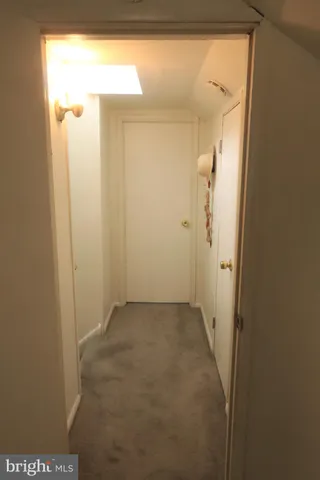 a kitchen with stainless steel appliances granite countertop a refrigerator a stove a sink and a microwave