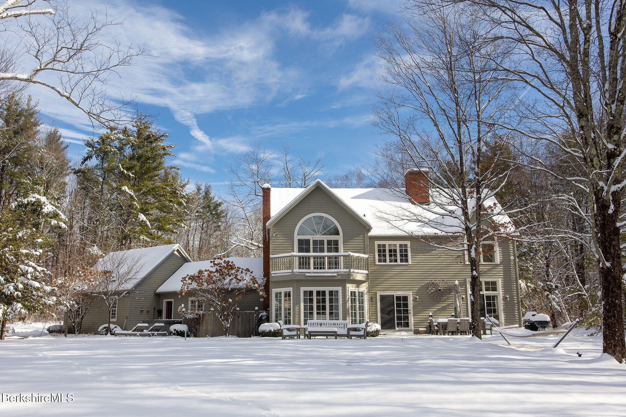 14 Old Tree Farm Road Stockbridge, MA 01266 - Photo 46 of 50 a view of a big house in the middle of a yard
