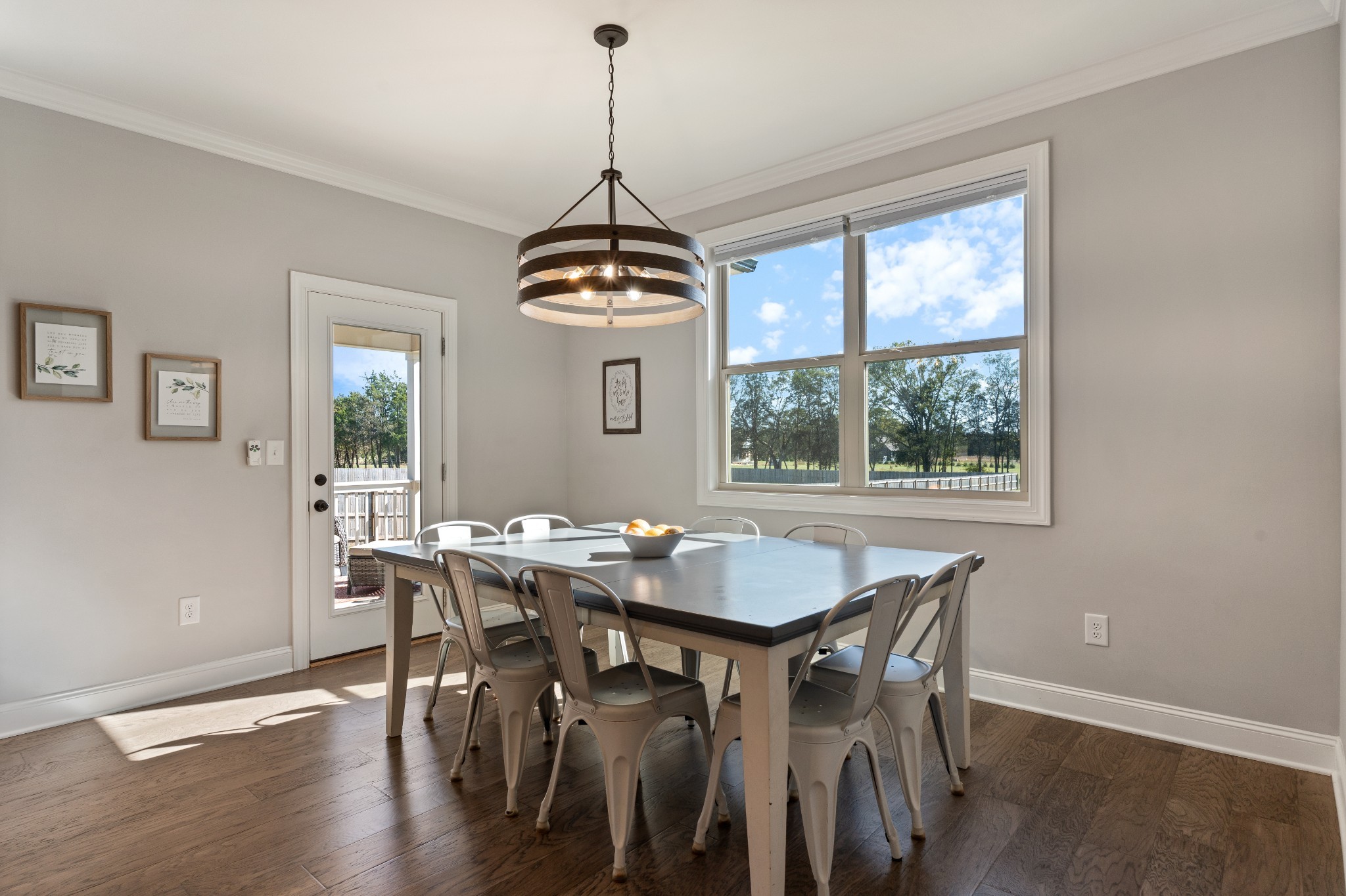 2070 Hamilton Chambers Road Lebanon, TN 37087 - Photo 16 of 43 a view of a dining room with a table chairs and chandelier