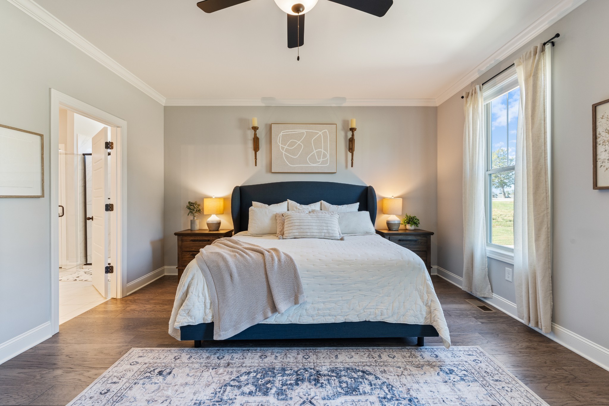 2070 Hamilton Chambers Road Lebanon, TN 37087 - Photo 18 of 43 a bedroom with a bed and wooden floor