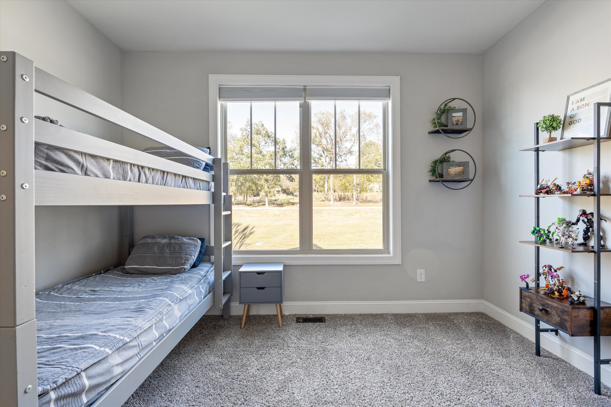 2070 Hamilton Chambers Road Lebanon, TN 37087 - Photo 21 of 43 a bedroom with a bed and window