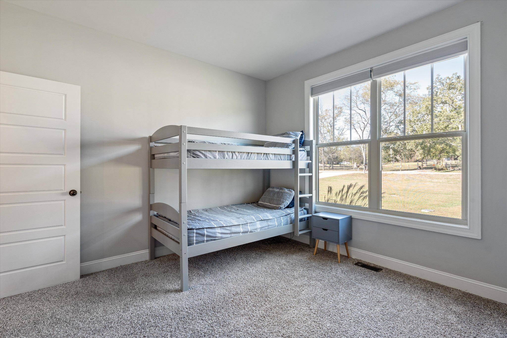 2070 Hamilton Chambers Road Lebanon, TN 37087 - Photo 22 of 43 a bedroom with a bunk bed and a window