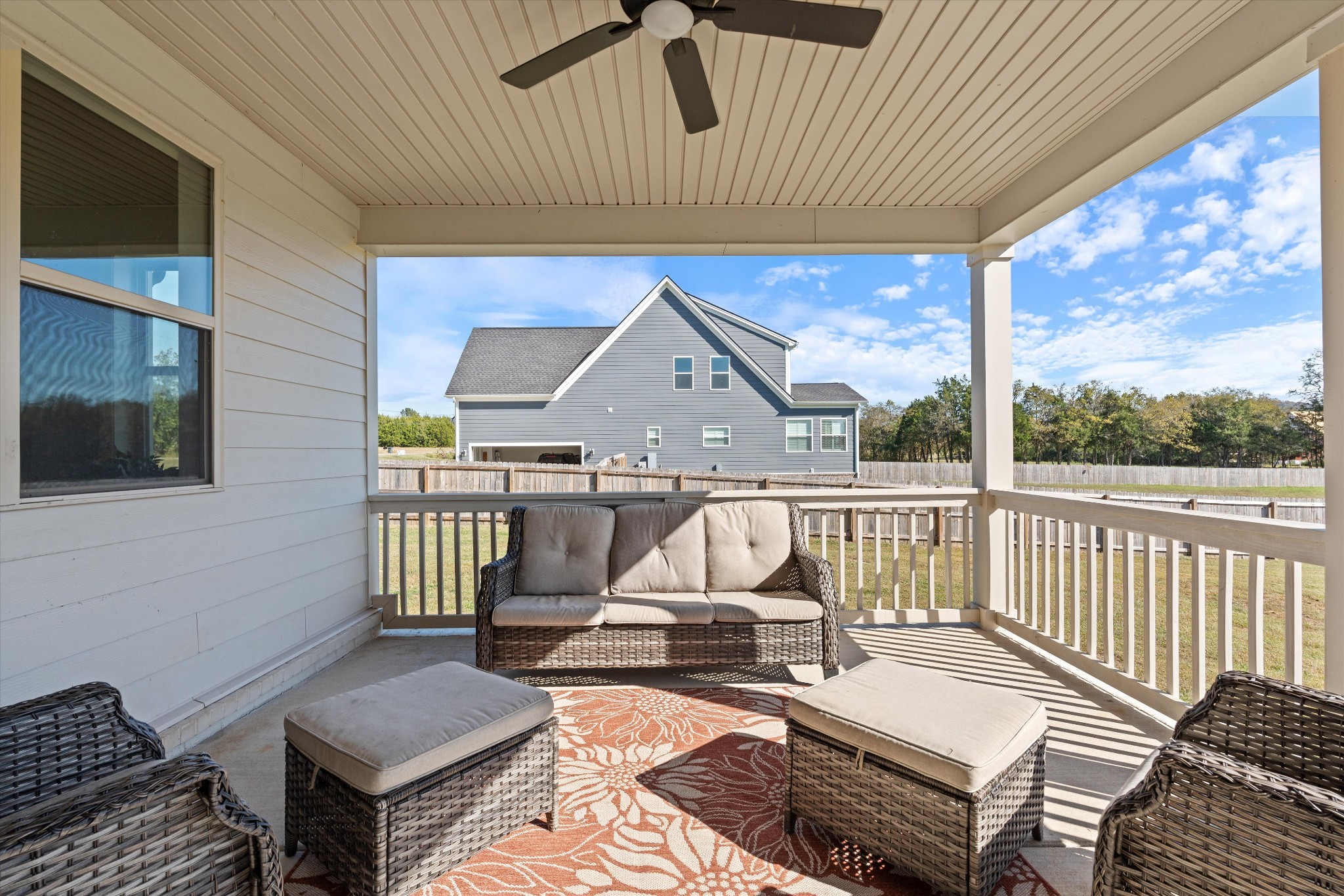 2070 Hamilton Chambers Road Lebanon, TN 37087 - Photo 34 of 43 a view of balcony with wooden floor and outdoor seating