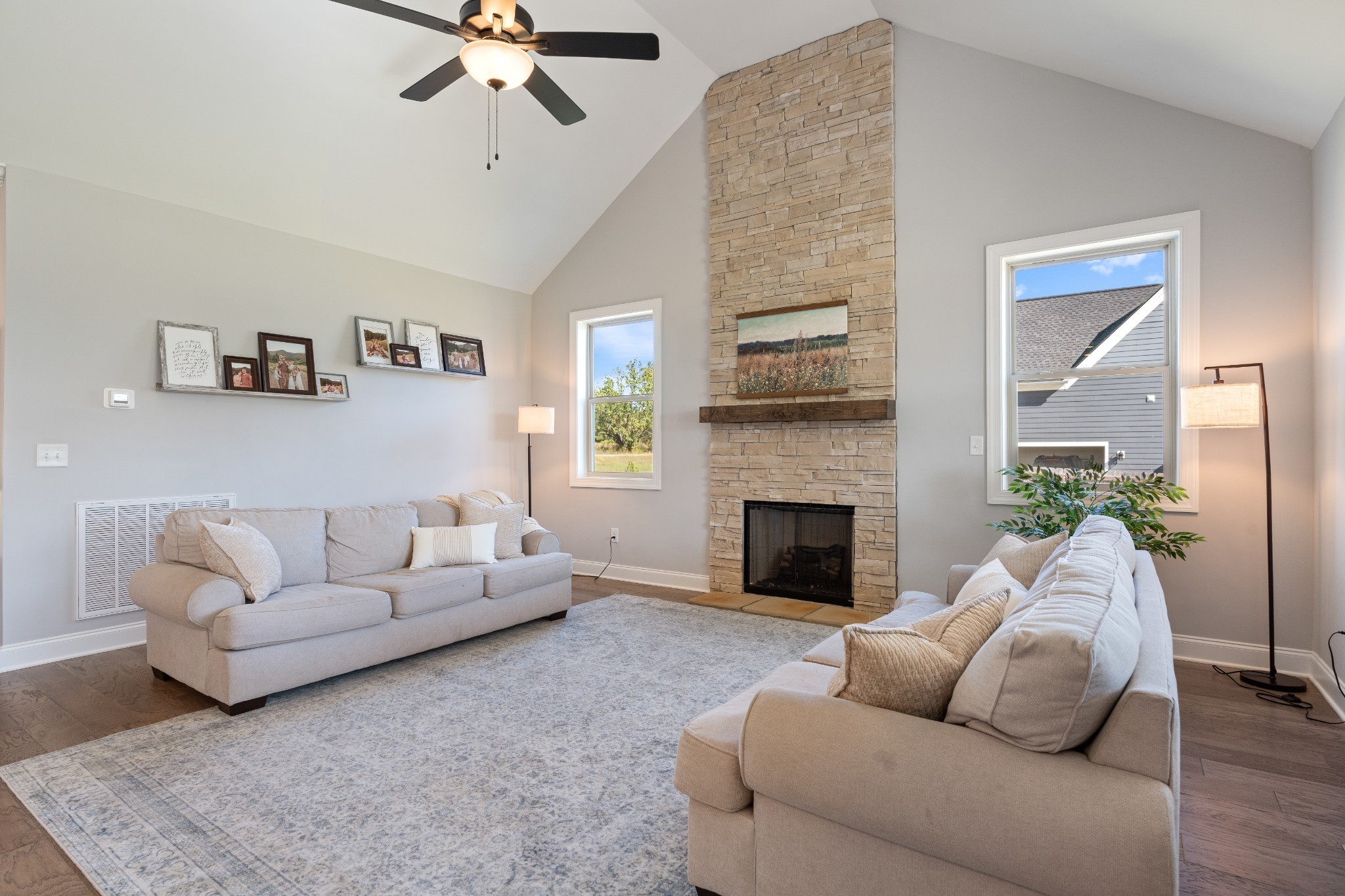 2070 Hamilton Chambers Road Lebanon, TN 37087 - Photo 9 of 43 a living room with furniture and a fireplace