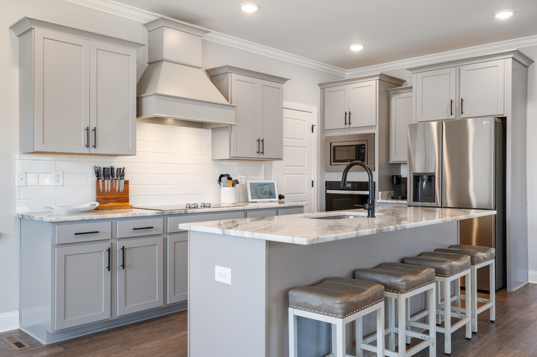 2070 Hamilton Chambers Road Lebanon, TN 37087 - Photo 10 of 43 a kitchen with cabinets and stainless steel appliances