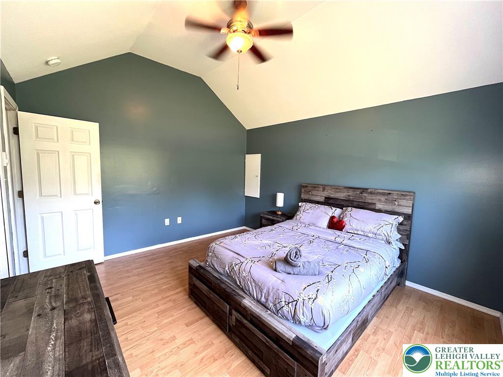 1646 Clover Road Long Pond, PA 18334 - Photo 7 of 24 A vaulted ceiling and warm wood flooring define this restful private retreat.