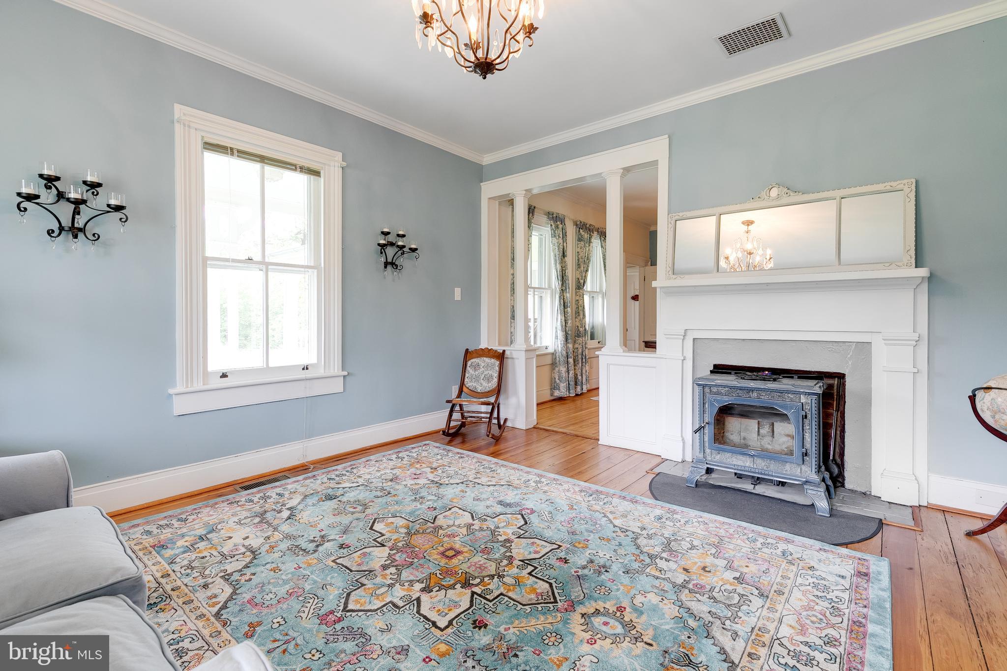 2379 Pendleton Road Mineral, VA 23117 - Photo 11 of 55 a living room with furniture and a fireplace